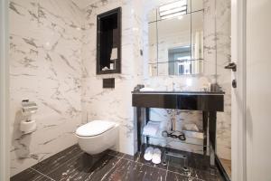 Koupelna v ubytování Boutique Hotel La Roche