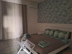 Ένα ή περισσότερα κρεβάτια σε δωμάτιο στο Il Verde Rifugio