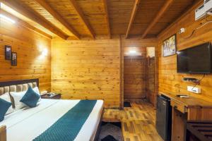 Μια τηλεόραση ή/και κέντρο ψυχαγωγίας στο Royal woods By DLC RESORTS