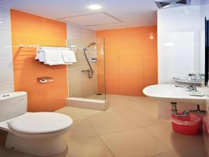 Koupelna v ubytování Graha Cempaka Boutique Hotel + 33 fotografií