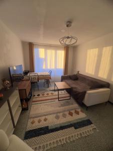 Khu vực ghế ngồi tại CozyT2 44m2 Quality bed, well-equipped kitchen +8 ảnh