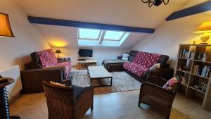 Posezení v ubytování DOMAINE DES GRAVIERS