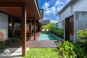 an external view of a villa with a swimming pool at Soocha B by Bukit Vista in Ungasan