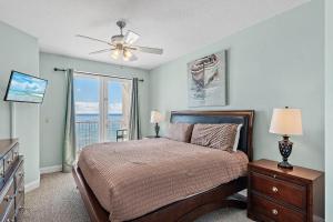 Giường trong phòng chung tại Sea Dunes 603 +42 ảnh