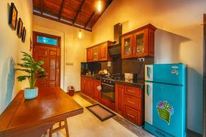 Kuchyň nebo kuchyňský kout v ubytování Serene View Lodge