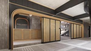 een lobby met een deur met een bord erop bij ClubRock Perlis in Kaki Bukit