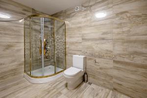 Ванная комната в Luxury Apartment III