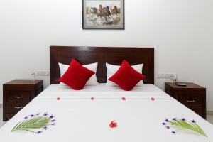 En eller flere senge i et værelse på Blue Breeze Tangalle + 23 billeder