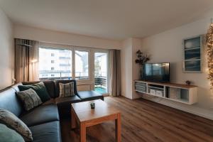 TV a/nebo společenská místnost v ubytování LAAX Homes Casa Curnera 1-6