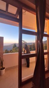 Nespecifikovaný výhled na hory nebo výhled na hory při pohledu z ubytování v soukromí + 7 fotografií