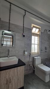 Koupelna v ubytování Red Cherry Homestay, Nokdara