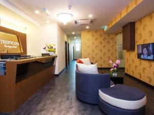 TV a/nebo společenská místnost v ubytování Tropicana Boutique Hotel