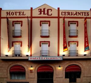 a building with a hotel sign on the side of it at Hotel Cervantes in Zafra