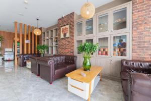 Posezení v ubytování Jinjiang Inn Style Tianjin Wuqing Traditional Chinese Medical Hospital