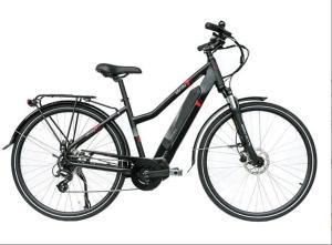 a black bike is parked on a white background at Aurora Andøya Suites in Andøya