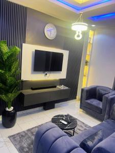 TV a/nebo společenská místnost v ubytování KUNBIZ APARTMENTs