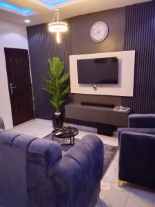 TV a/nebo společenská místnost v ubytování KUNBIZ APARTMENTs