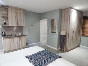 Kuchyň nebo kuchyňský kout v ubytování 18onkuruman