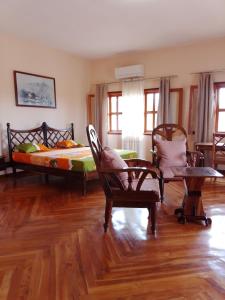 Posezení v ubytování Green Garden Lodge