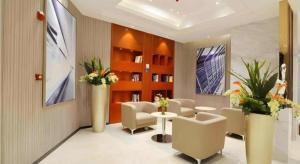 TV a/nebo společenská místnost v ubytování City Comfort Inn Foshan Nanhai Avenue Guicheng Metro Station