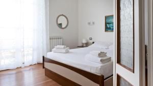 A bed or beds in a room at Italianway-Piazza Firenze