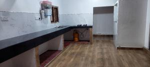 an empty room with a counter and a fire hydrant at MD Retreat in Kalpitiya
