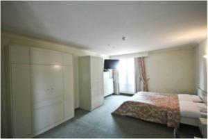 Postel nebo postele na pokoji v ubytování Hotel de modern
