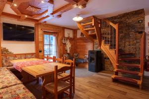 Et opholdsområde på Chalet Canedi - Maso dei Cuori