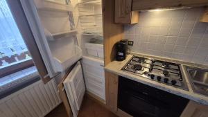 Køkken eller tekøkken på Dolomiti Sweet Home