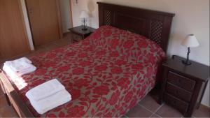 Giường trong phòng chung tại Quinta de Agriboa House