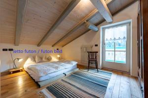 Postel nebo postele na pokoji v ubytování Cesa Cres