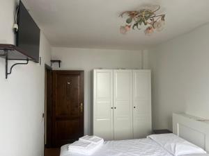 En eller flere senge i et værelse på Villetta a Sestola