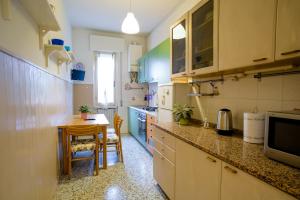 Η κουζίνα ή μικρή κουζίνα στο Rossi Boutique Apartment