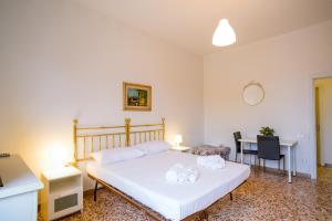Ένα ή περισσότερα κρεβάτια σε δωμάτιο στο Rossi Boutique Apartment