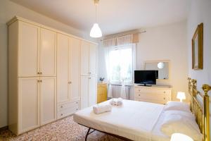 Ένα ή περισσότερα κρεβάτια σε δωμάτιο στο Rossi Boutique Apartment