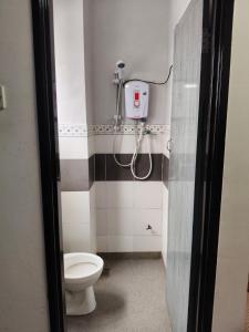 Koupelna v ubytování Ian's homestay II tanahrata chighlands