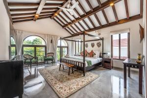 En eller flere senge i et værelse på Casa Del Mundo + 54 billeder