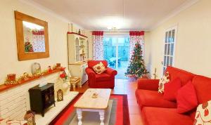 Et opholdsområde på Amazing Cottage set in Tranquil Hamlet nr Beach & Attractions - Perfect for Couples & Family's, Large Garden, Private Parking & Pets are Welcome too!