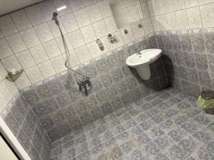 Koupelna v ubytování Хотел Роджърс