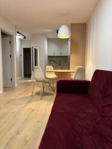 Posezení v ubytování Eden Apartment