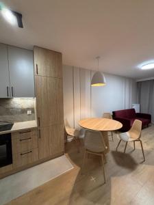Kuchyň nebo kuchyňský kout v ubytování Eden Apartment + 4 fotografie