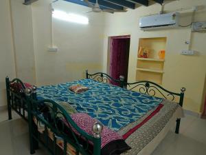 Postel nebo postele na pokoji v ubytování Swamy home stay TVM