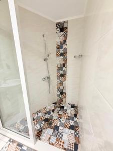 Et badeværelse på Center Apartments The Quiet Luxury 6 + 24 billeder