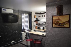 Køkken eller tekøkken på Квартира - студія