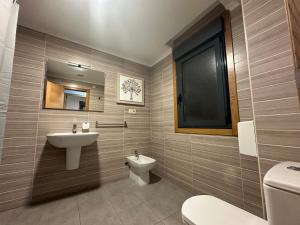 Et badeværelse på Pensión Villa Mayer - Grupo Arcanos