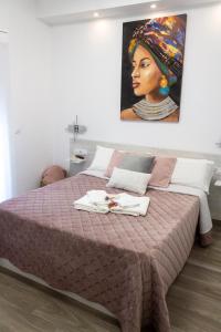 En eller flere senge i et værelse på Tres Torres Apartamento Turístico