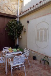 En terrasse eller udendørsområde på Tres Torres Apartamento Turístico