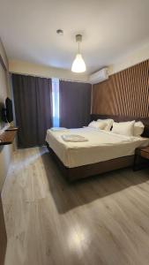 Postel nebo postele na pokoji v ubytování Moda Hotel + 29 fotografií