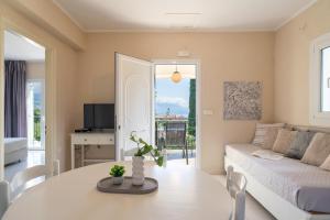 TV a/nebo společenská místnost v ubytování Residence Poseidon