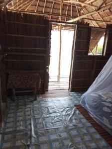 a room with a bed and a window at Blacktive Homestay in Kri +23 photos